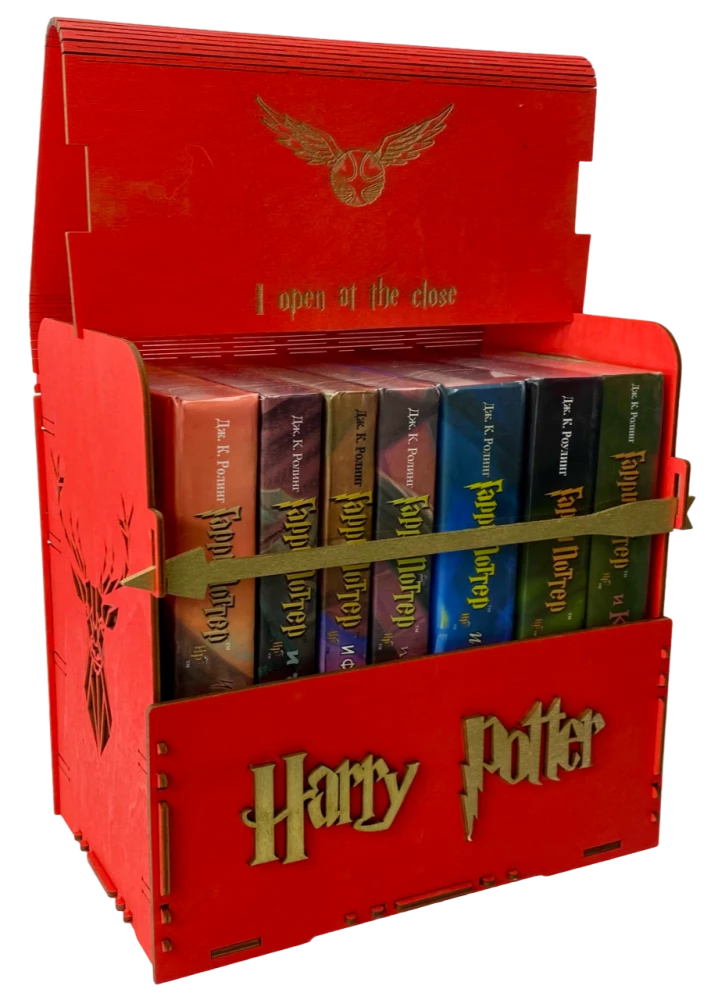 Red book set of Harry Potter in a wooden chest