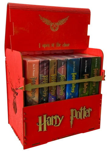 Red book set of Harry Potter in a wooden chest