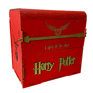 Red book set of Harry Potter in a wooden chest