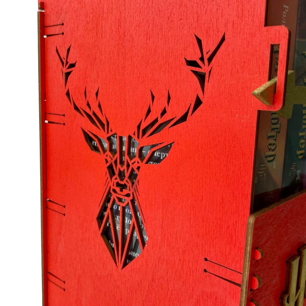 Red book set of Harry Potter in a wooden chest