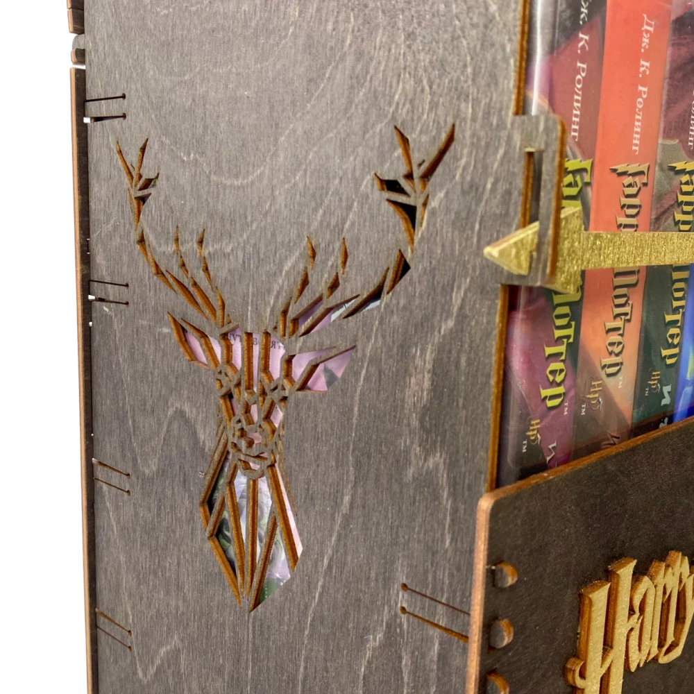 Black set of Harry Potter books in a wooden chest